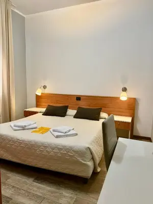 Letto o letti in una camera di Hotel Delle Rose