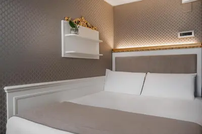 Letto o letti in una camera di Hotel Montecarlo