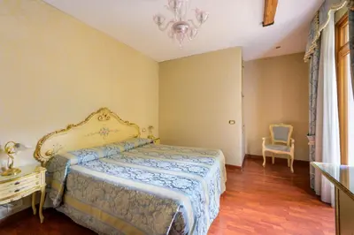 Letto o letti in una camera di Locanda Al Leon