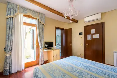 Letto o letti in una camera di Locanda Al Leon