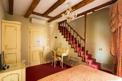 Letto o letti in una camera di Locanda Al Leon