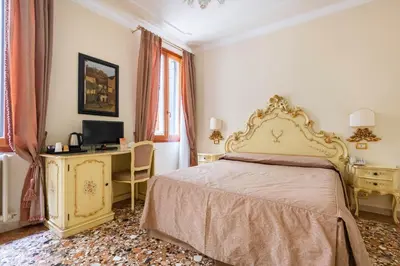 Letto o letti in una camera di Locanda Al Leon
