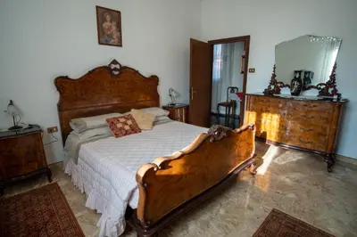 Letto o letti in una camera di Casa Eden