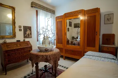 Letto o letti in una camera di Casa Eden