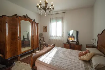 Letto o letti in una camera di Casa Eden