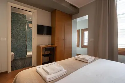 Letto o letti in una camera di VeNICe Cera Tintoretto Suites