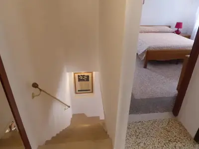 Letto o letti in una camera di A due passi dall'antico Ghetto, sestiere di Cannaregio