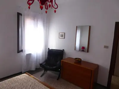 Letto o letti in una camera di A due passi dall'antico Ghetto, sestiere di Cannaregio