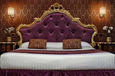 Letto o letti in una camera di Hotel Tre Archi