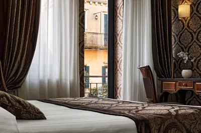 Letto o letti in una camera di Hotel Tre Archi