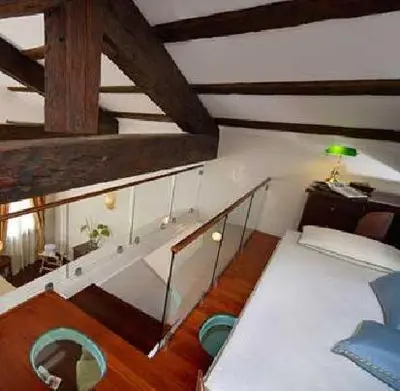 Letto o letti in una camera di La Rosa dei Venti