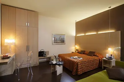 Letto o letti in una camera di Hotel Paris
