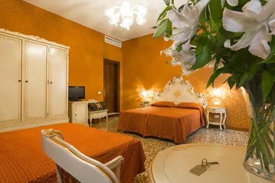 Letto o letti in una camera di Palazzo Guardi