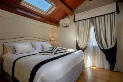 Letto o letti in una camera di Hotel Olimpia Venice, BW Signature Collection 3sup