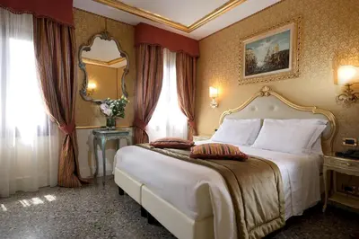 Letto o letti in una camera di Hotel Olimpia Venice, BW Signature Collection 3sup