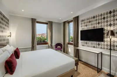 TV o dispositivi per l'intrattenimento presso Hotel Arlecchino