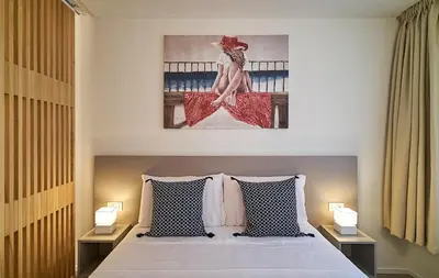 Letto o letti in una camera di Residenza SubitoSanto - Appartamento 3A 