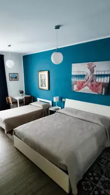Letto o letti in una camera di Residenza Capitello 48