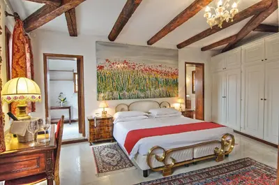 Letto o letti in una camera di Hotel La Fenice et Des Artistes