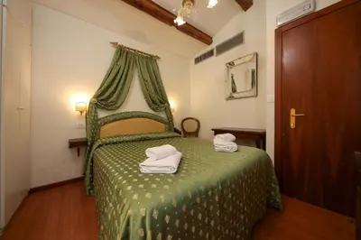 Letto o letti in una camera di Hotel Da Bruno