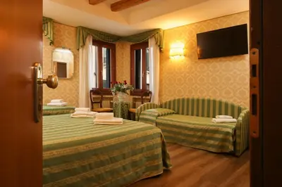 Letto o letti in una camera di Hotel Da Bruno