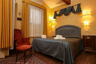 Letto o letti in una camera di Hotel Da Bruno