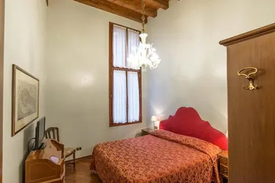 Letto o letti in una camera di Hotel Piccola Fenice