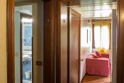 Letto o letti in una camera di Hotel Piccola Fenice
