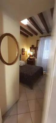 Letto o letti in una camera di Ca' del Forner