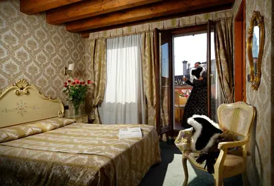 Letto o letti in una camera di Hotel Gorizia a La Valigia
