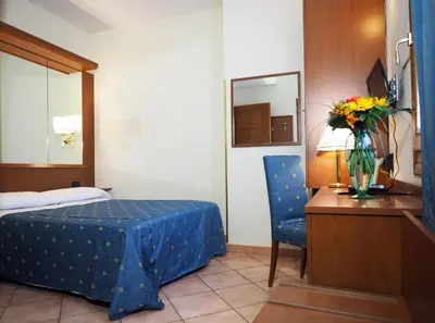 Letto o letti in una camera di Hotel Cris
