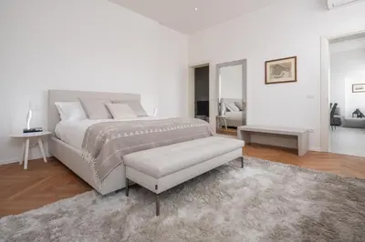 Letto o letti in una camera di Design Apartment with Balcony on the Grand Canal R&R
