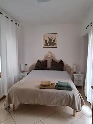 Letto o letti in una camera di Angolo di pace a pochi passi dal centro e dal mare