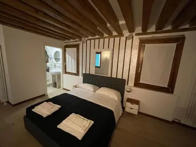 Letto o letti in una camera di Dimora Blu Suite