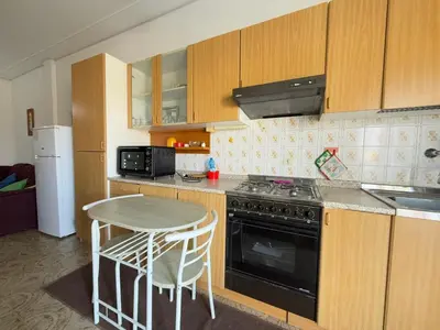 Cucina o angolo cottura di Condominio Mara- SOLO PER FAMIGLIE- Walterigato Apartments