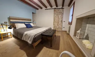 Letto o letti in una camera di Cà Wanda