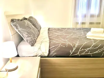 Letto o letti in una camera di Ca' Ormesini Lovely Apartment