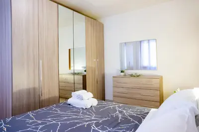 Letto o letti in una camera di Ca' Ormesini Lovely Apartment