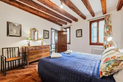 Letto o letti in una camera di Piazza San Marco Cozy Apartment x4