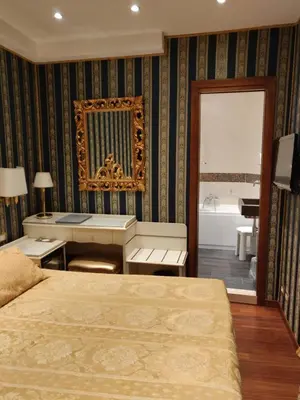 Letto o letti in una camera di Hotel Ca' Marinella