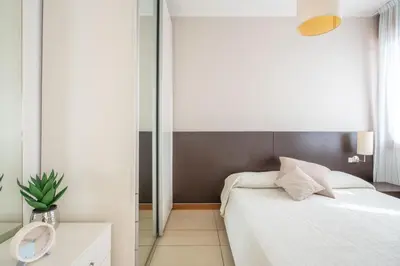 Letto o letti in una camera di RESIDENCE TORINO