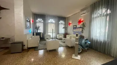 Area soggiorno di Momi's Hotel
