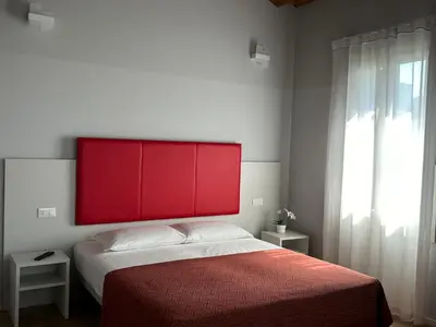 Letto o letti in una camera di Laguna Blu Mestre Venezia