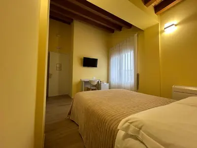 Letto o letti in una camera di Laguna Blu Mestre Venezia