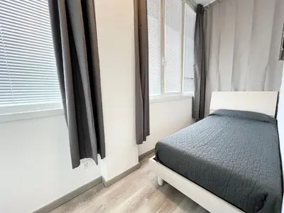 Letto o letti in una camera di Olimpo - Carraro Immobiliare - Family Apartments