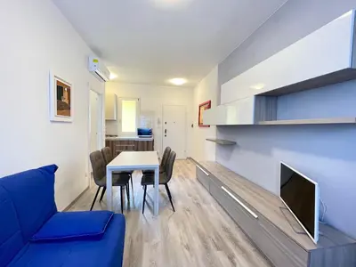 TV o dispositivi per l'intrattenimento presso Olimpo - Carraro Immobiliare - Family Apartments