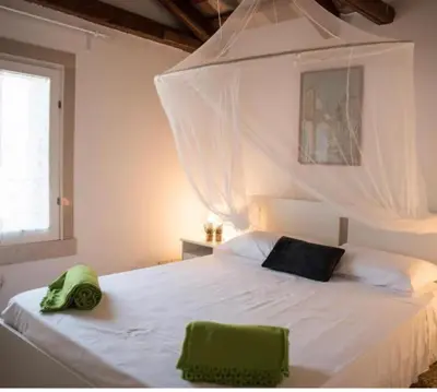Letto o letti in una camera di SALAMON GUEST HOUSE