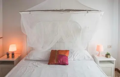 Letto o letti in una camera di SALAMON GUEST HOUSE