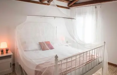 Letto o letti in una camera di SALAMON GUEST HOUSE