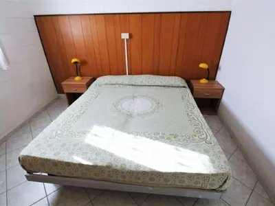 Letto o letti in una camera di Holiday Home in Rosolina Mare near Beach